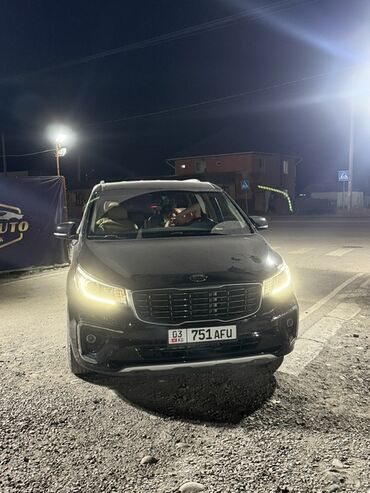 машины из кореи: Продается минивэн Kia Carnival черного цвета. Автомобиль имеет