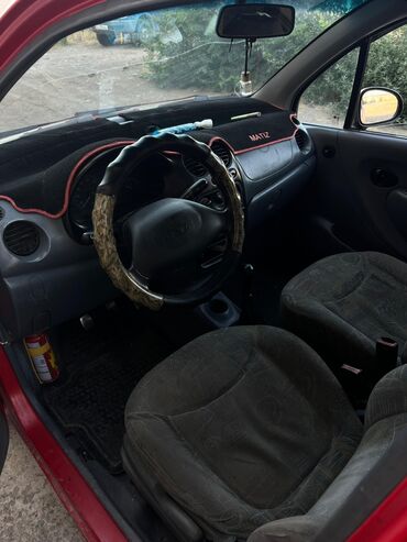 деово тико: Красный хэтчбек Daewoo Matiz, компактный и экономичный городской