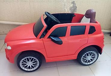 Uşaq üçün elektrikli minik maşını – qırmızı SUV dizaynı cox az