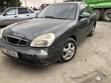 мир шина: Daewoo Nubira: 1999 г., 1.6 л, Механика, Бензин, Седан