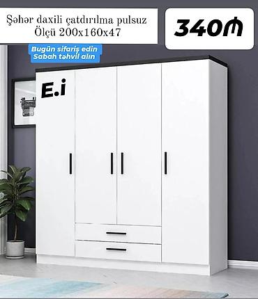 Ev üçün mebel: Ağ rəngdə, minimalist dizaynlı dörd qapılı paltar dolabı. Mərkəzdə — 1