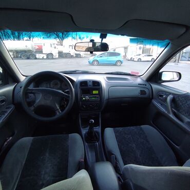 Mazda: Mazda Familia: 1998 г., 1.5 л, Механика, Бензин, Хэтчбэк — 12