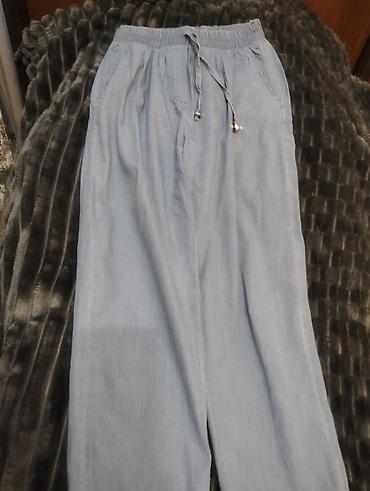 Yüngül denim görünümlü açıq mavi şalvar - Model: rahat “wide-leg” lalafo.az -da Yüngül denim görünümlü açıq mavi şalvar - Model: rahat “wide-leg”