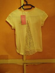 push up busqalterləri: Uşaq/bluzka – qısaqol, krem rəngdə. Arxa hissədə dekorativ üçbucaq