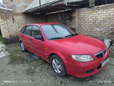 Mazda: Mazda 323: 2003 г., 1.6 л, Механика, Бензин, Хэтчбэк