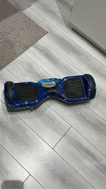 Elektrikli hovərbord (segway) - Korpusu: kosmos temalı mavi rəngli