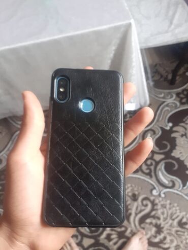 телефон fly ezzy 5: Xiaomi Mi A2 Lite, 32 ГБ, цвет - Синий, 
 Гарантия, Сенсорный, Отпечаток пальца