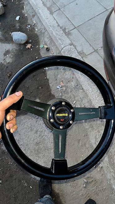bmw rolu: Momo rul Mebeldir reyzin deyil masinlara gedir ustunde ki podstavka — 1