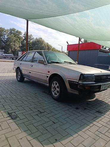 авто ярис: Nissan Bluebird: 1989 г., Механика, Хэтчбэк — 5