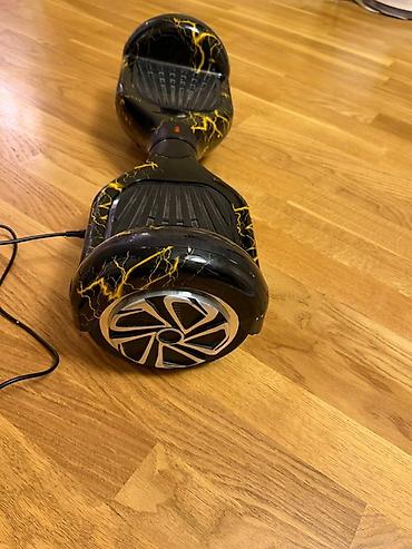 Giroskuterlər: Elektrikli hoverboard (gyroskuter) - Rəng/naxış: Qara korpus üzərində — 2
