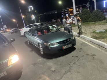 купить квадрик: Купе Toyota Camry Solara зеленого цвета с люком на крыше. Автомобиль