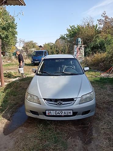 дачный: Mazda Familia: 2002 г., 1.3 л, Механика, Бензин, Хэтчбэк — 1
