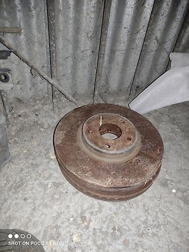 dirsək altı: Ford fujin ucun apornu disqi ela veziyyetde.Ustden cixma őn diskler — 1