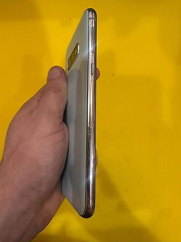 pleystein 4 pro: Samsung Galaxy S10e, 128 GB, rəng - Ağ, Simsiz şarj — 5