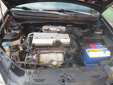 kia optima nece masindi: Kia Rio: 1.4 l | 2008 il Sedan — 1
