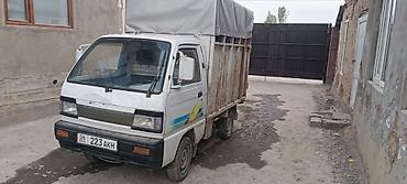 b4 б4: Компактный грузовой микро-грузовик с тентованным кузовом. - Формат — 1