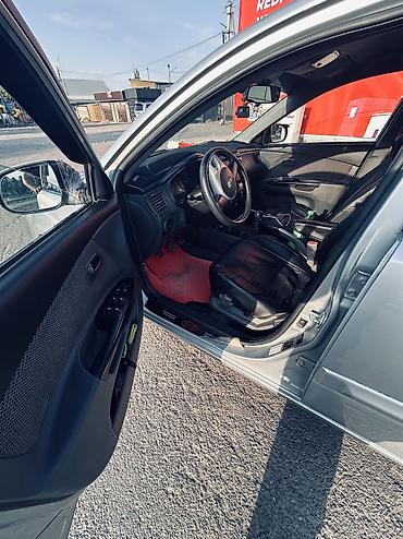 Kia: Kia Rio: 2010 г., 1.4 л, Механика, Бензин, Хэтчбэк — 11