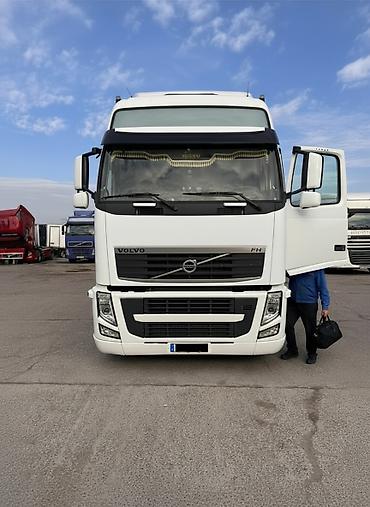 вольво тандем: Тягач, Volvo, 2012 г., Шторный — 1