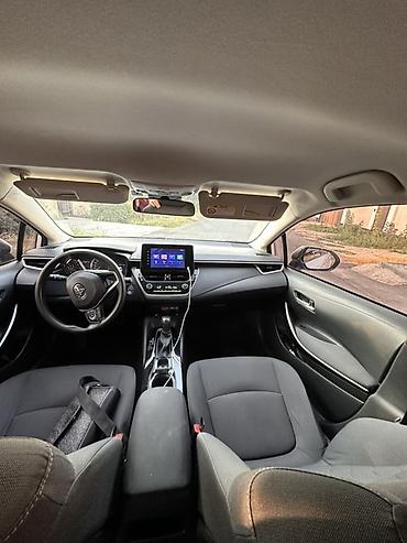 byd e2: Toyota Corolla: 2022 г., 1.8 л, Автомат, Гибрид, Седан — 4