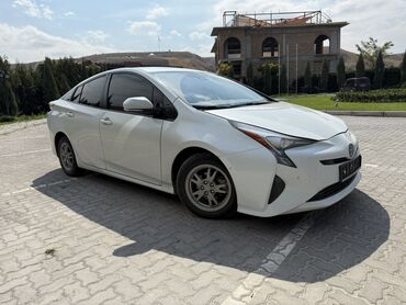 диска шницер: Toyota Prius (четвёртое поколение), белый перламутр, кузов лифтбек 5