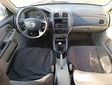 мазда 363: Mazda 323: 2003 г., 1.6 л, Механика, Бензин, Универсал — 8