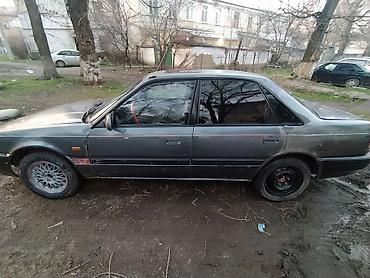 мото номер: Mazda 626: 1990 г., 2 л, Механика, Бензин, Седан — 4