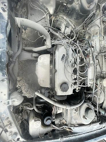 рампы: Бензиновый мотор Mitsubishi 1994 г., 1.8 л, Б/у, Оригинал, Япония — 1