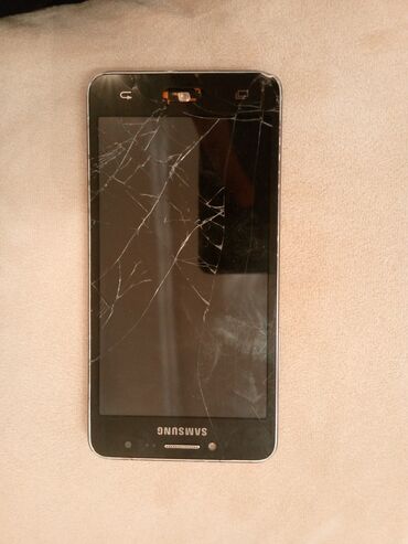 Mobil telefonlar: Samsung Galaxy J2 Core, 8 GB, rəng - Qara, Qırıq, Sensor, İki sim kartlı