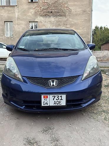 byd e2 2025: Honda Fit: 2010 г., Бензин, Хэтчбэк — 1