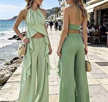 helanke sorc: Komplet crop top sa volanima,vezuje se oko vrata,gola ledja i duboke — 5