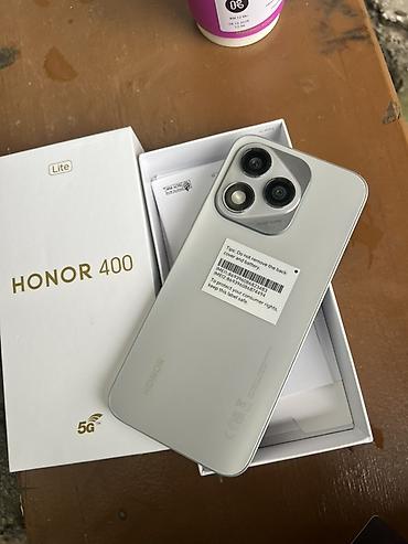 honor robot: HONOR 400 Lite 5G — смартфон в светлом цвете с коробкой и комплектной — 1