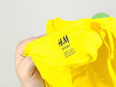 plny lala: H&M Sport, Top damski, rozmiar L — 4