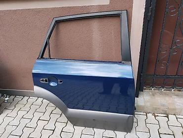 VRATA ZADNJA DESNA ZA HYUNDAI TUCSON OD 2002. DO 2010. GOD. | u