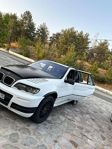 nissan note bufer: Ağ rəngli, geniş salonlu . BMW x5 sadece karobkasinda prablem var — 1