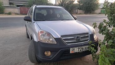 домкраты на авто: Продается Honda CR-V серебристого цвета, представленная на