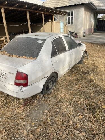 купить багажник на крышу автомобиля бу: Mazda Familia: 2001 г.