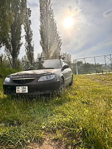 мазда фемили: Mazda 323: 2002 г., 1.6 л, Механика, Бензин, Хэтчбэк — 2