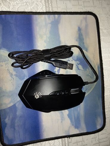 Адаптеры питания для ноутбуков: Bloody brendinə məxsus qara rəngli oyun siçanı. USB kabel ilə qoşulur