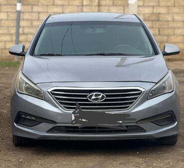 mersedes unversal: Kia K5 avtomobili rahat və şık sedandır. Ağ rəngdə olan bu avtomobil