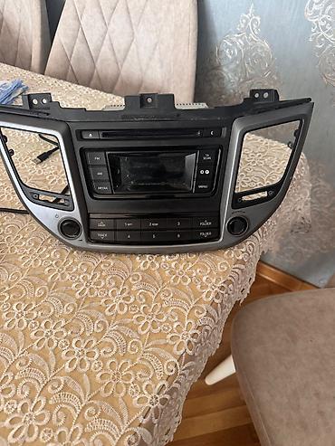 dinami: Hyundai ix35/Tucson üçün orijinal mərkəzi konsol multimedia/radio blok — 2