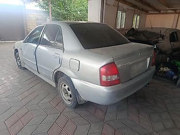 Mazda: Mazda 323: 2002 г., 1.6 л, Механика, Бензин, Седан — 2
