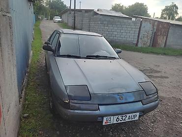 Mazda: Mazda 323: 1994 г., Механика, Бензин — 1