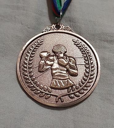 İdman kubokları və medalları: Boks medal dəsti - Rənglər: qızıl, gümüş, bürünc - Dizayn: Hər iki — 13