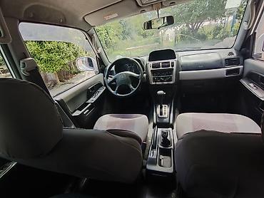 7 nəfərlik avtomobillər: Mitsubishi Pajero: 1.8 l | 1998 il 350000 km Ofrouder/SUV — 6