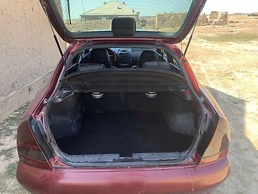 буу донголок chevrolet malibu шина: Mitsubishi Carisma: 1998 г., Седан — 9