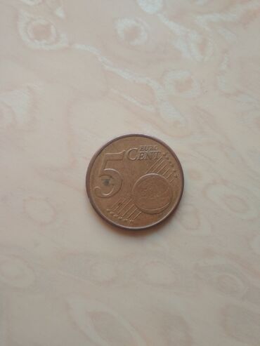 1 sent nece manatdir: 5 avro sent (Yunanıstan 2009-cu il) Materialı - mis ilə örtülmüş