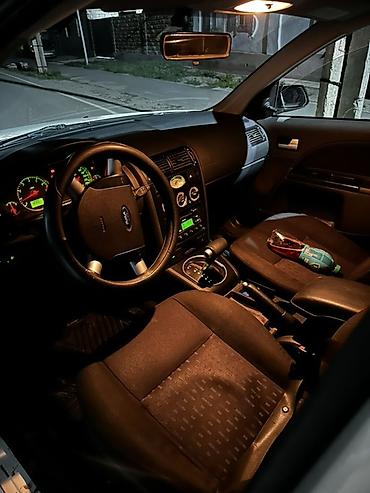 опел вектр: Ford Mondeo: 2002 г., Универсал — 7