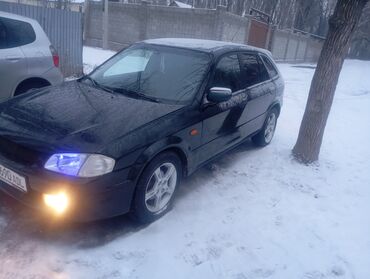 Mazda: Mazda 323: 1999 г., 1.6 л, Механика, Бензин, Хэтчбэк