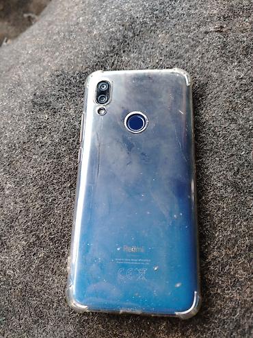 korpuslar: Redmi smartfon - Model: Redmi (M1906F9LG yazısı görünür – Redmi 8/8A — 1