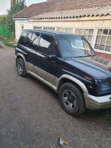 авто прсеп: Продается внедорожник Suzuki. Автомобиль темно-синего цвета с